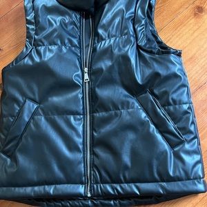 Faux leather vest.